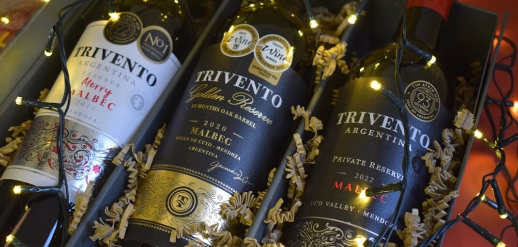 A curated selection of premium wine bottles arranged on a wooden surface ready for wine delivery NZ